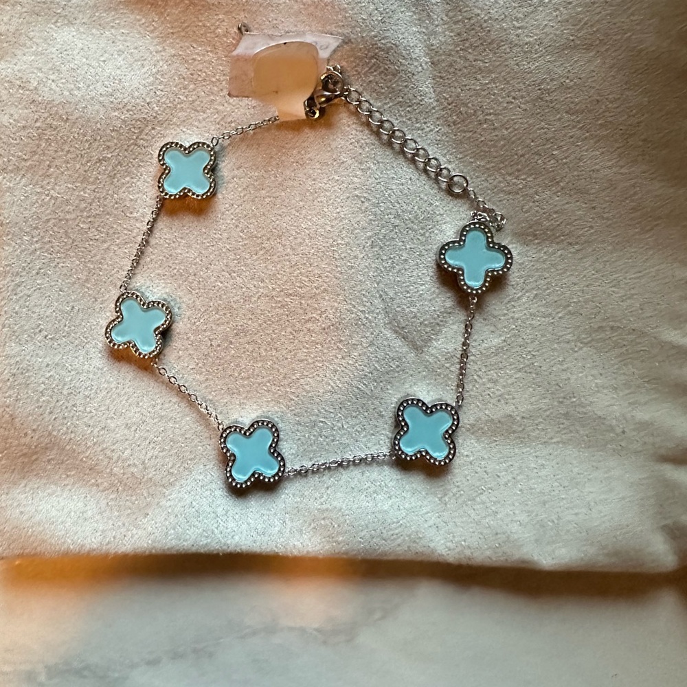 New.. Baby blue silver clover bracelet / costume jewelry